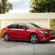 2018 Subaru Legacy - Red Exterior - Front Side Quarter - Close up