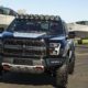 Ford F-150 Raptor F-22 Concept along side Lockheed Martin F-22 Raptor - Black Exterior - Front