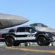 Ford F-150 Raptor F-22 Concept along side Lockheed Martin F-22 Raptor - Black Exterior - Front SideView