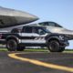Ford F-150 Raptor F-22 Concept along side Lockheed Martin F-22 Raptor - Black Exterior - Side View