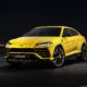 2018 Lamborghini Urus SUV - Yellow Exterior - Front Side View - Black Background
